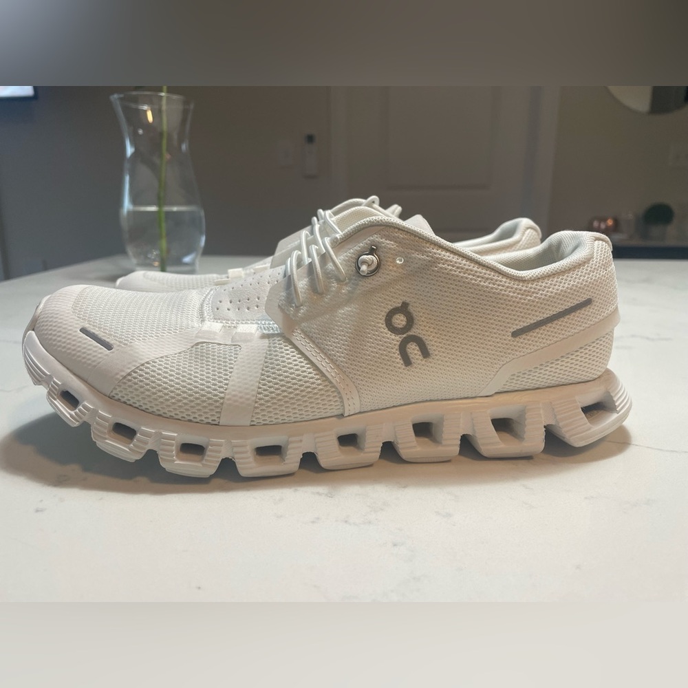 All white on cloud slide on sneakers